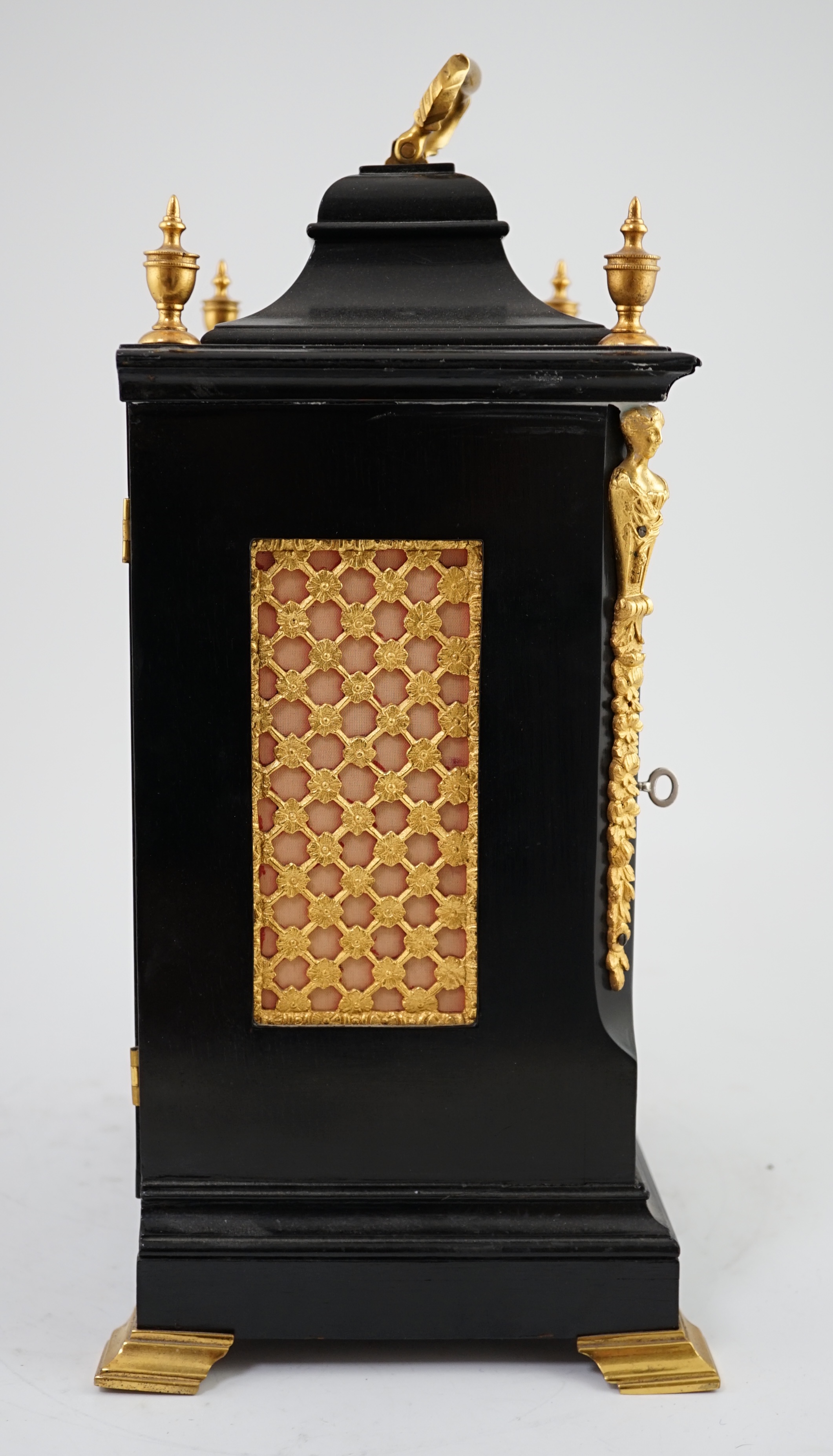 A Victorian ormolu mounted ebonised chiming bracket clock